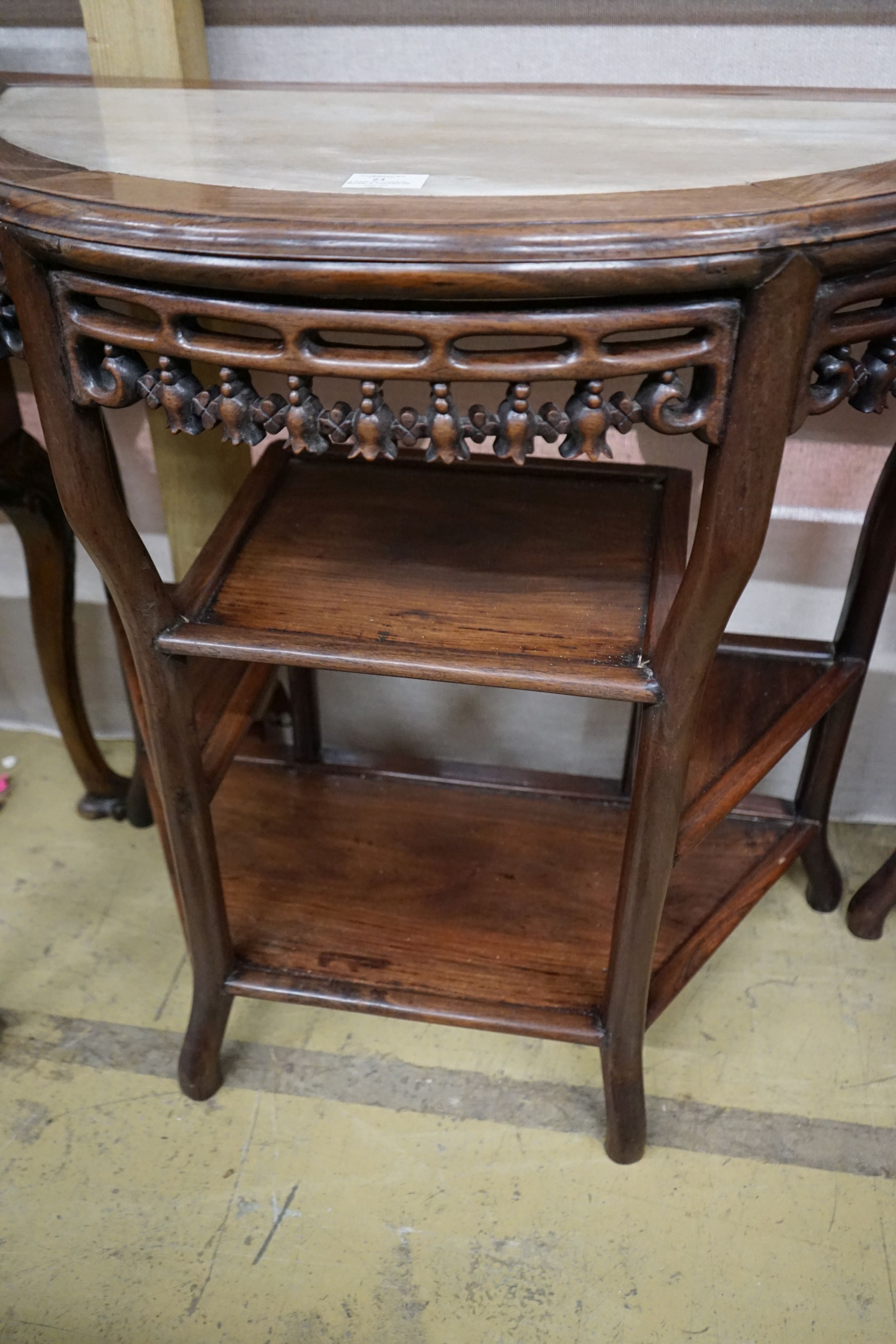 A pair of Chinese marble-topped demi lune console tables, width 82cm, depth 40cm, height 80cm